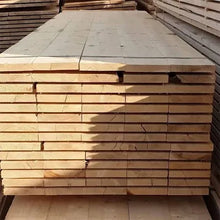 Load image into Gallery viewer, Stack of high-quality scaffold boards available from Brunswick Turf, ideal for construction, landscaping, and garden projects. Durable and neatly stacked for easy handling 2